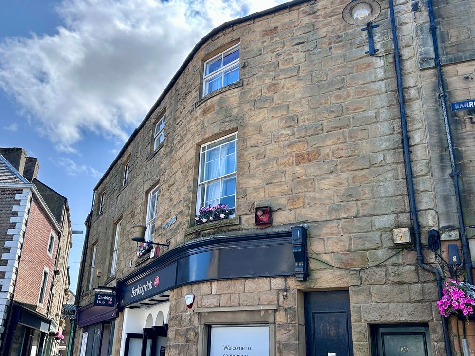 A building with windows and signage at Downton I Alnwick