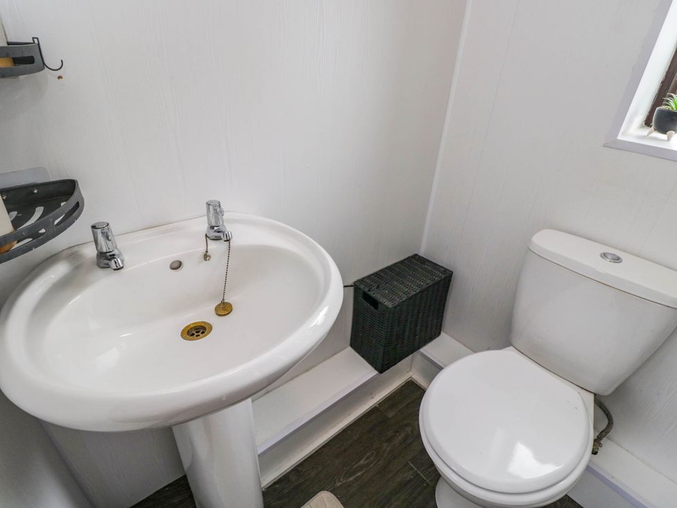 A bathroom with a sink and toilet at 1 Stanway Road 