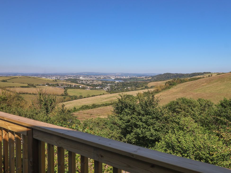 A scenic view of hills and a city in the distance at Lodge 19 Millbrook