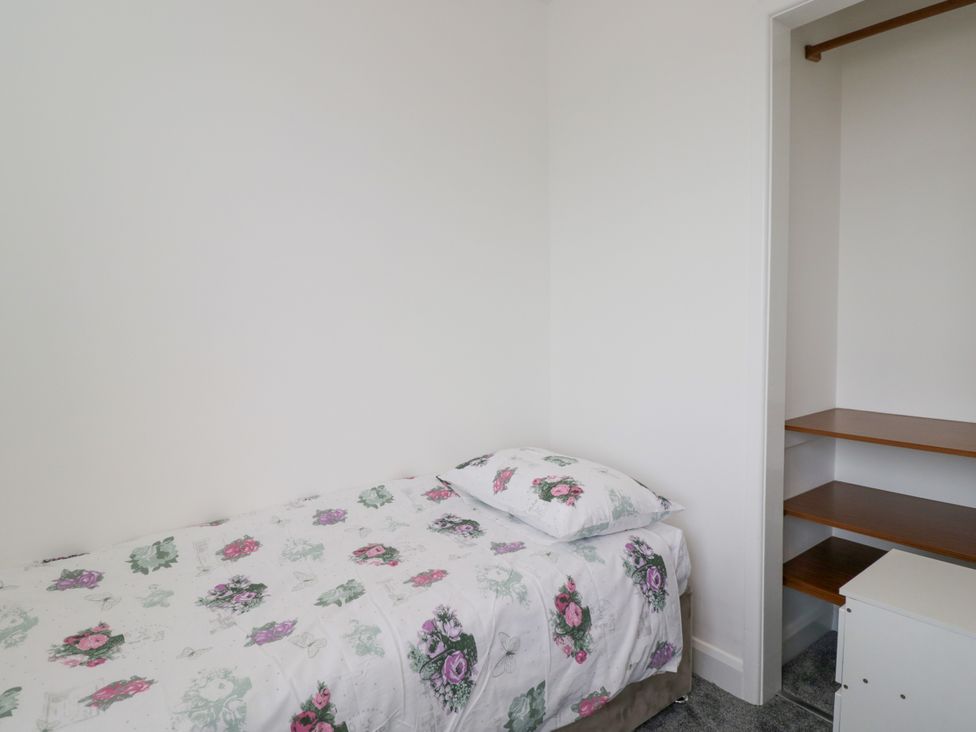 A bedroom with a bed and closet at 167 Leybourne Avenue Bournemouth