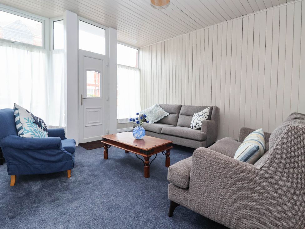 A living room with sofas and a coffee table at 154 Queen Street in Withernsea