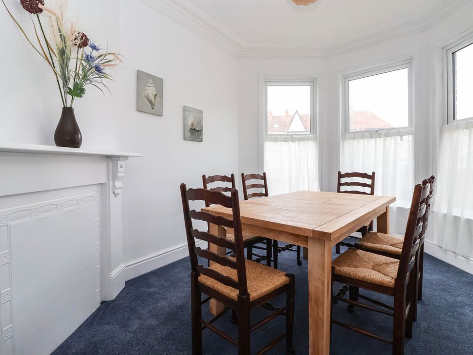 A dining room with a table and chairs at 154 Queen Street in Withernsea