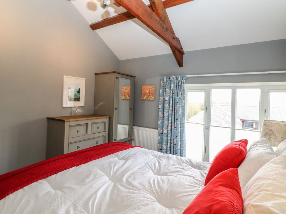 A bedroom with a bed and dresser at Argal in Treverva near Constantine