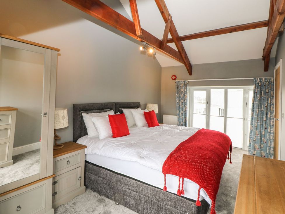 A bedroom with a bed and a dresser at Argal in Treverva near Constantine