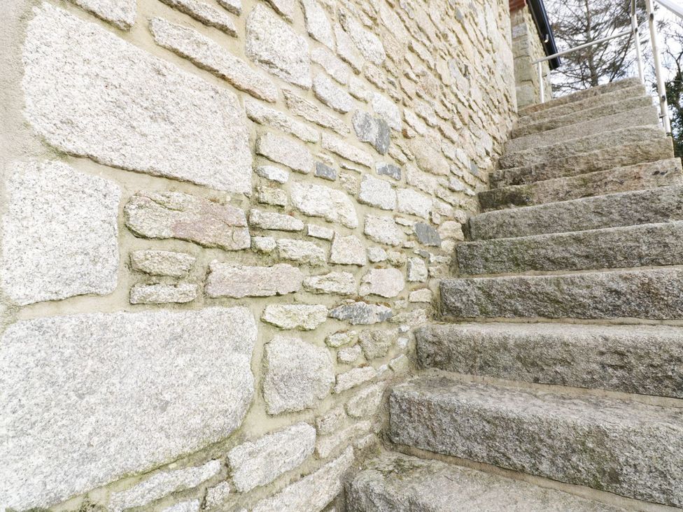 A stone staircase with a stone wall at Argal Treverva near Constantine