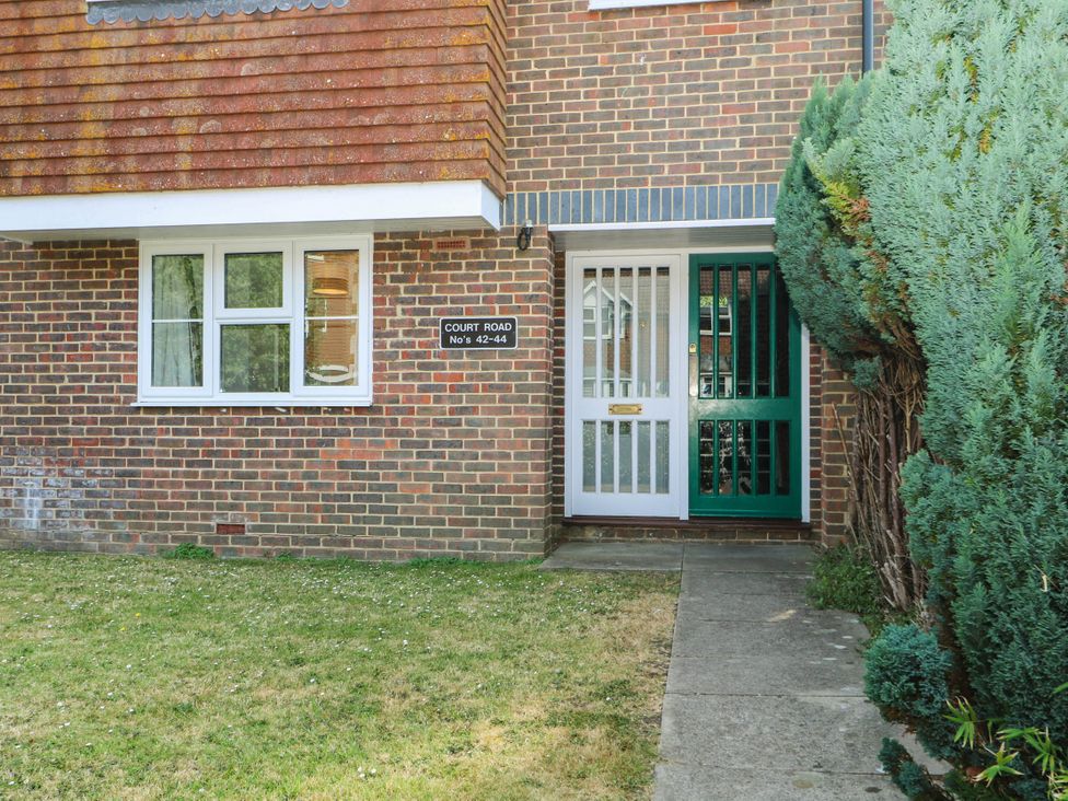 An entrance with a green door and a window at 44 Court Road in Lewes, Sussex