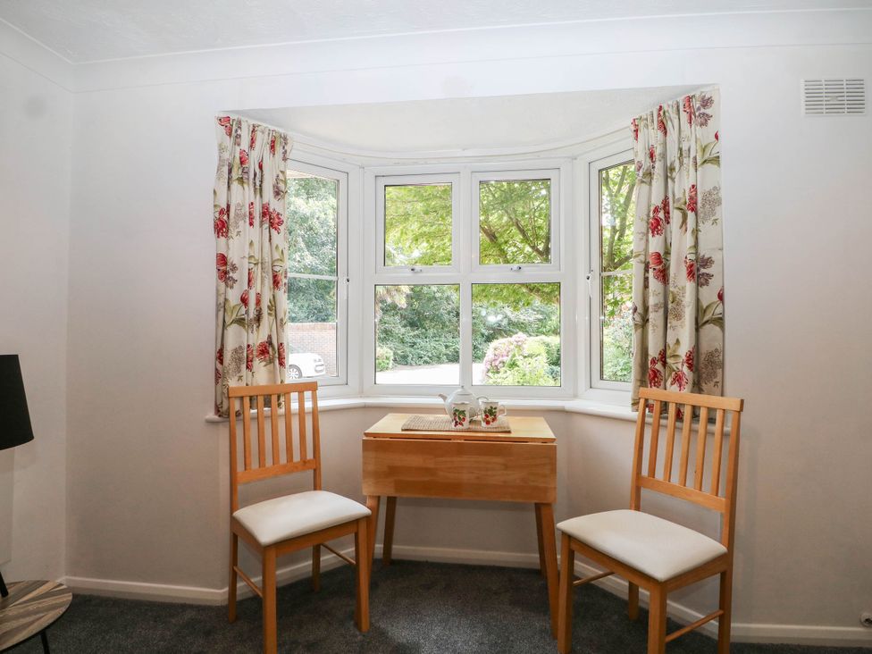A dining area with a table and chairs at 44 Court Road in Lewes, Sussex