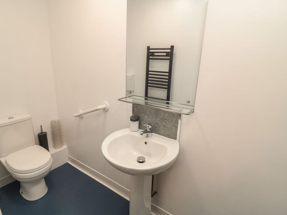 A bathroom with a toilet and sink at Kirkstead in Billinghay, Lincolnshire