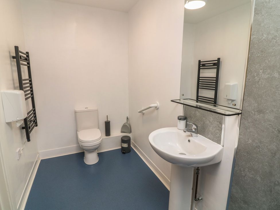 A bathroom with a toilet and sink at Tupholme in Billinghay, Lincolnshire