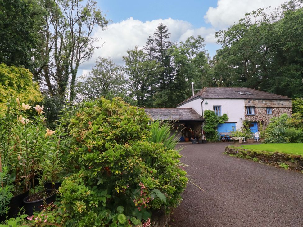 A house with garden and trees at The Water Mill at Boyton Mill Launceston