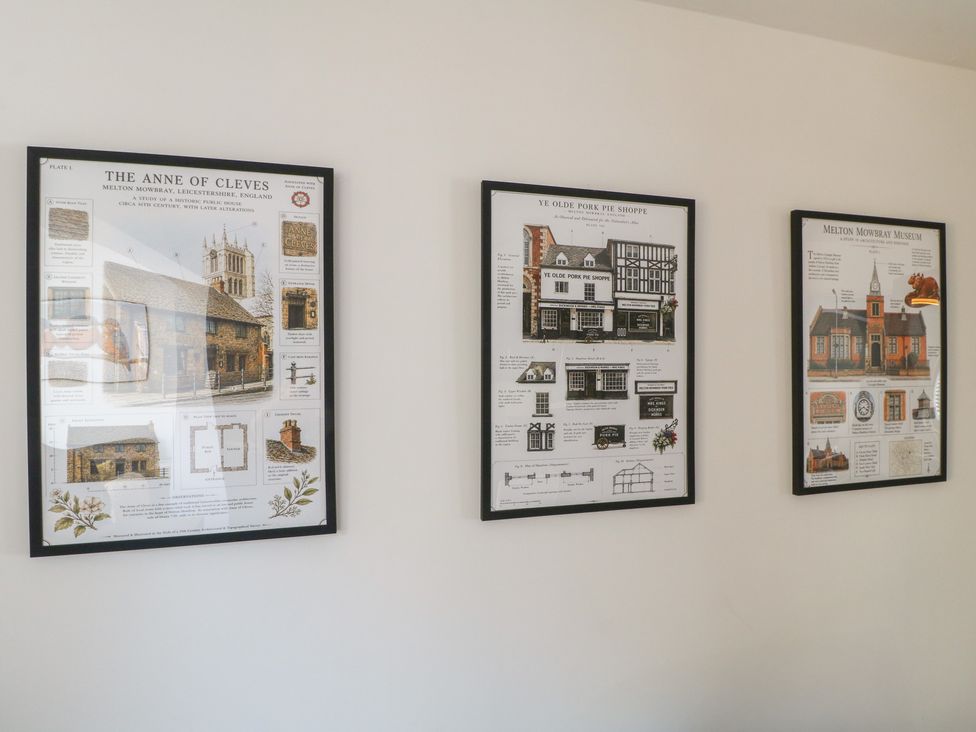 Framed informational posters of local historical sites at The Kingfisher Falls in Melton Mowbray