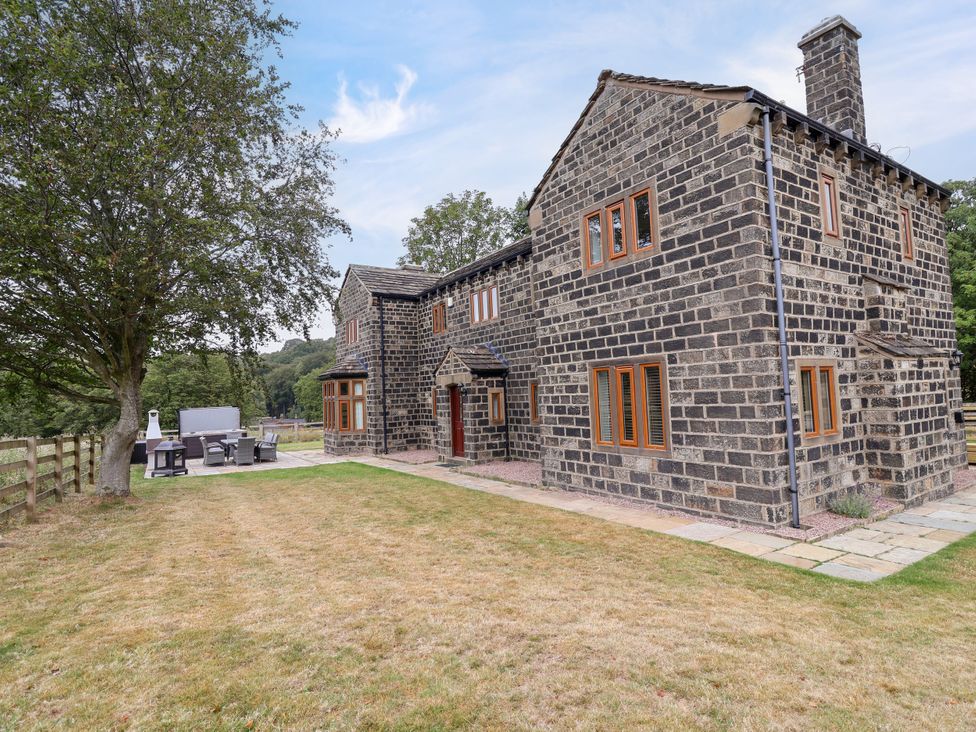 A house with a patio and garden at Greenfield Manor near Greenfield