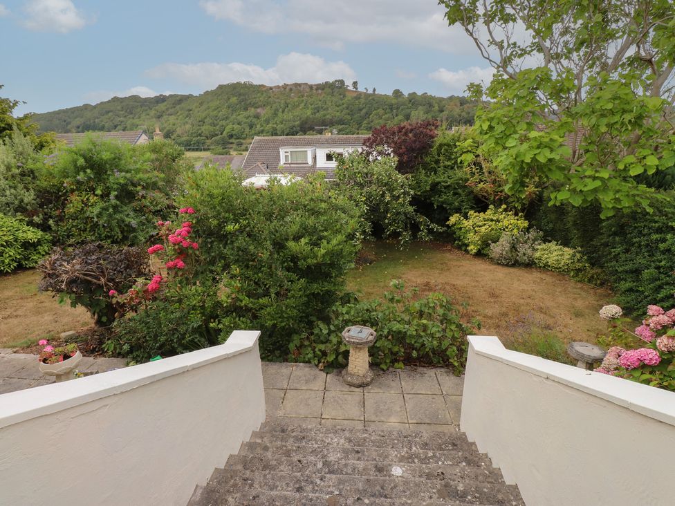 A garden with steps leading down at Nampara in Colwyn Bay
