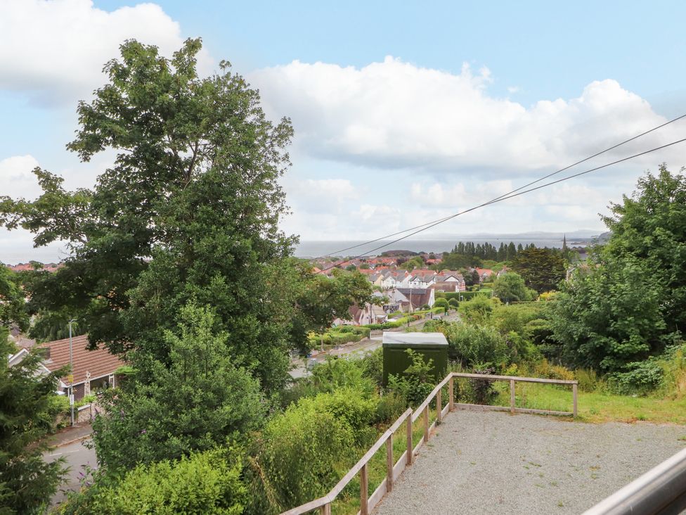 A view of a residential area with trees and houses at The Barn at Bryn Eithin Colwyn Bay