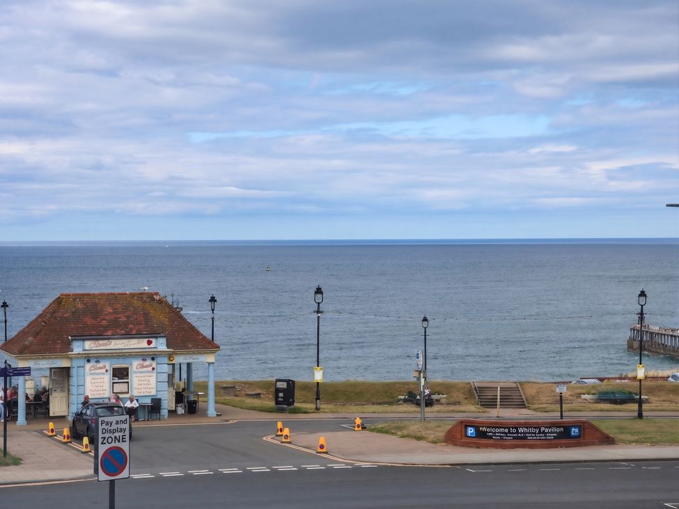 An outdoor view of the sea and Whitby Pavilion at Sea View Apartment in Whitby