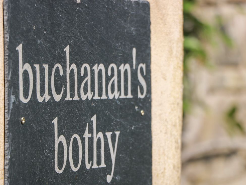 A sign displaying the text 'buchanan's bothy'