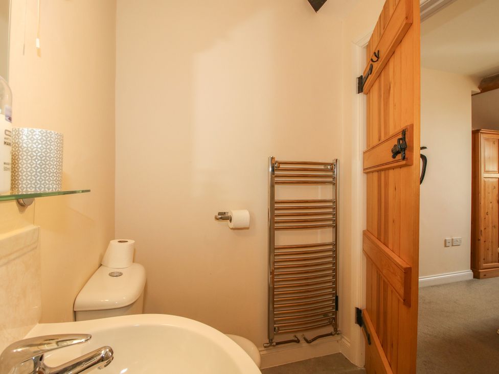 A bathroom with a sink and toilet at The Hop Kiln in Tenbury Wells