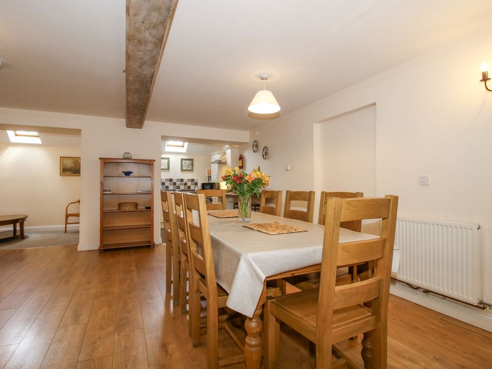 A dining room with a table and chairs at The Hop Kiln in Tenbury Wells