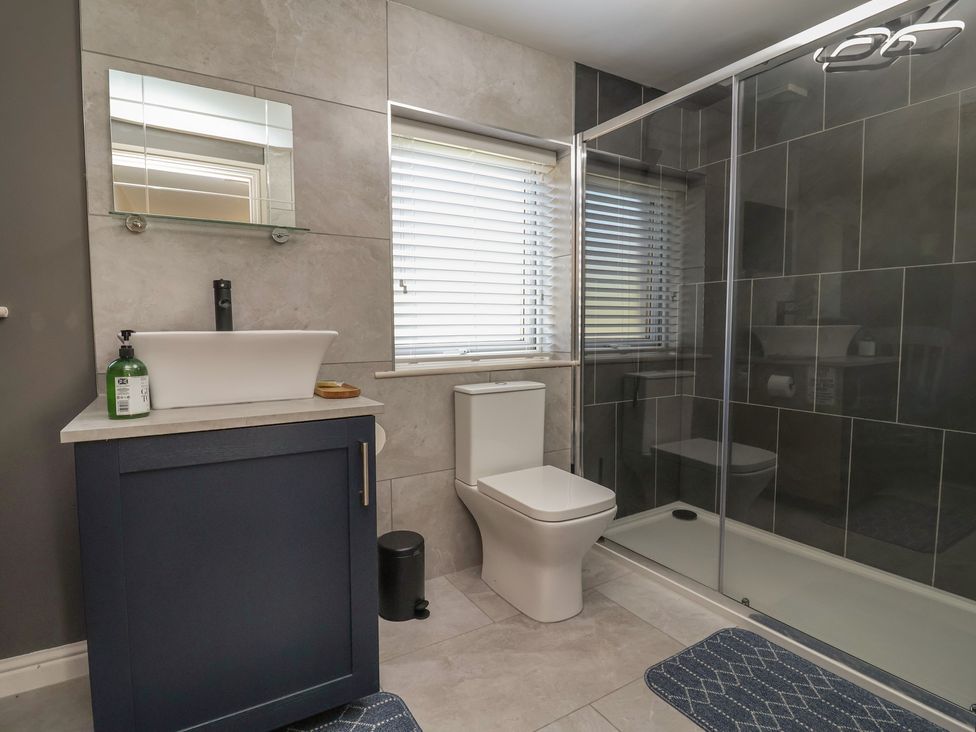 A bathroom with a sink and toilet at The Old Shady Oak Cottage in High Peak