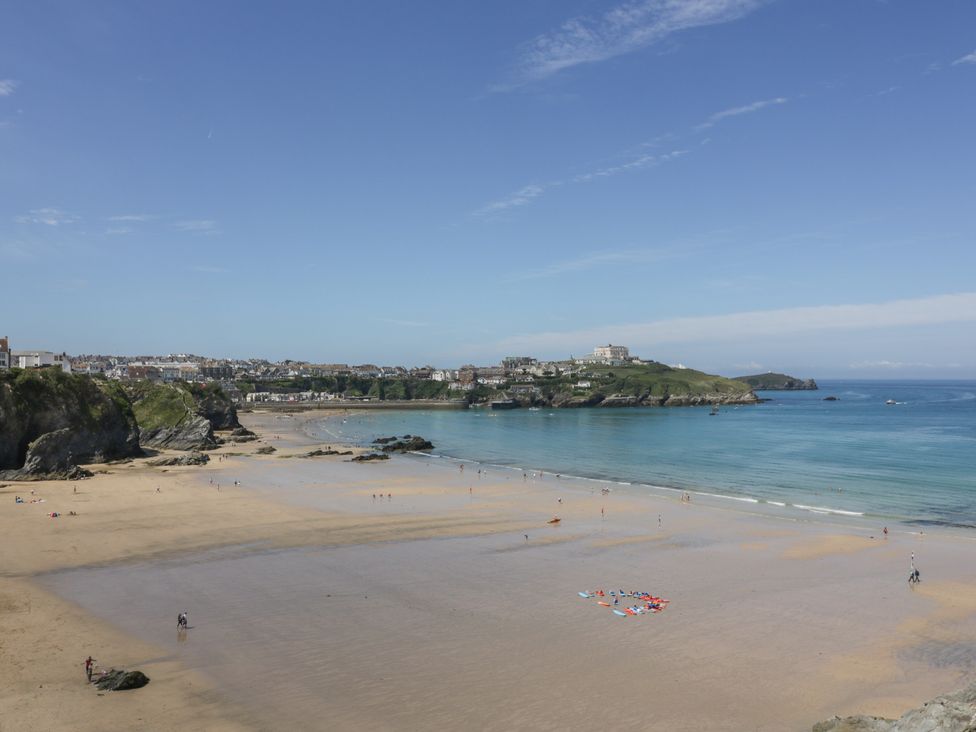 A beach with people at Shoreline Apartment No.8 in Newquay