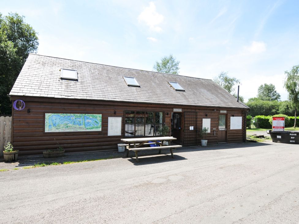 A building with a map and table at Caravan in Dolton