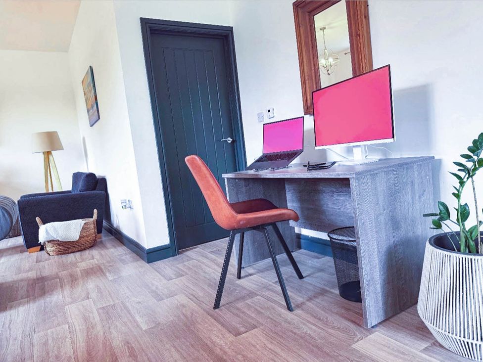 A home office with a desk and computers at Stunning Retreat in the Heart of Matlock Bath