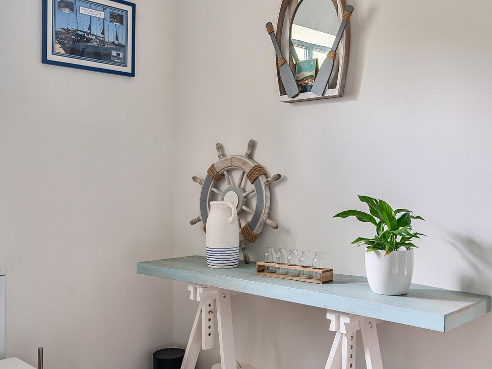 A table with nautical decor and glassware at Stunning Retreat in the Heart of Matlock Bath