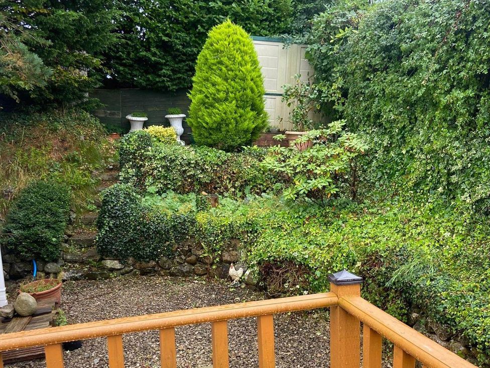 A garden with steps and plants at a property in unspecified location