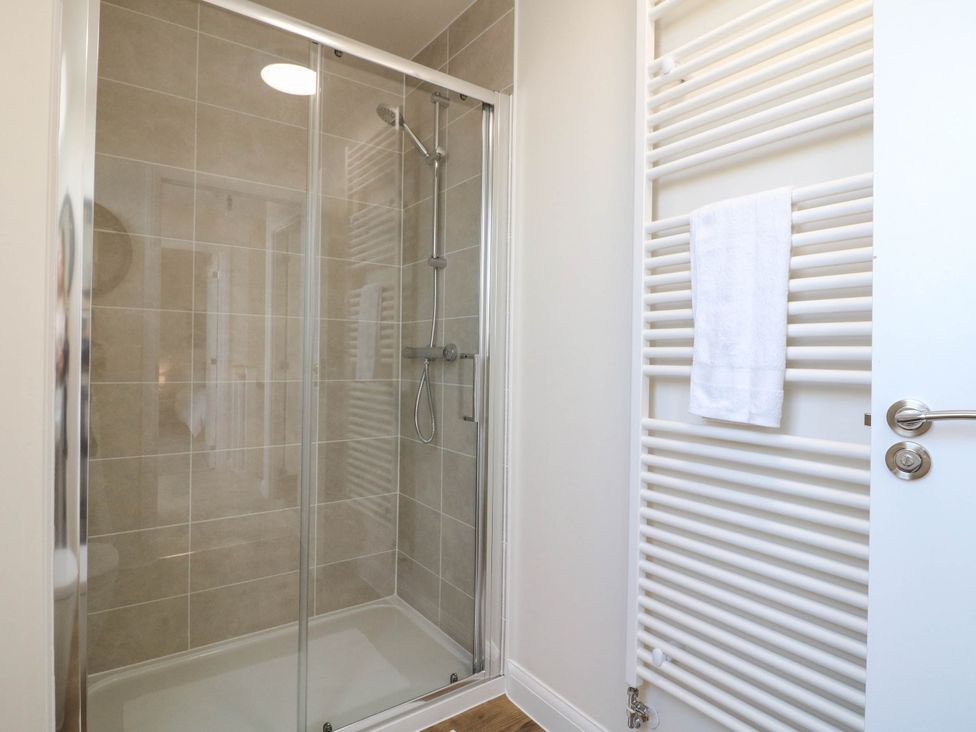 A shower area with towel rail at No.6 Beck Crescent in Ashbourne