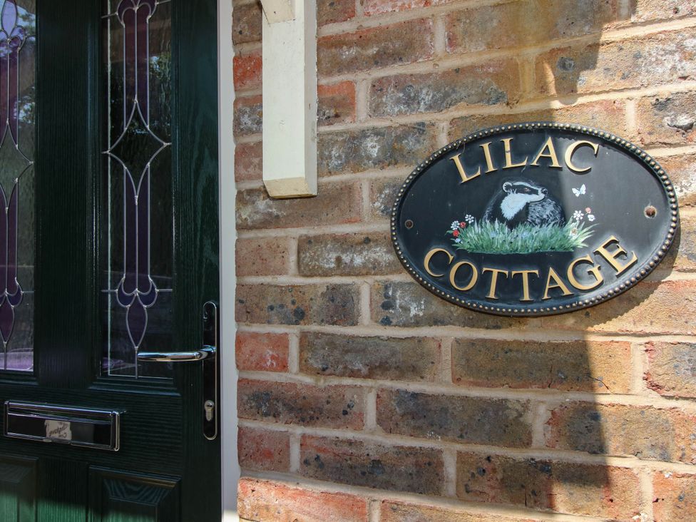 A door and nameplate at Lilac Cottage in Ironbridge