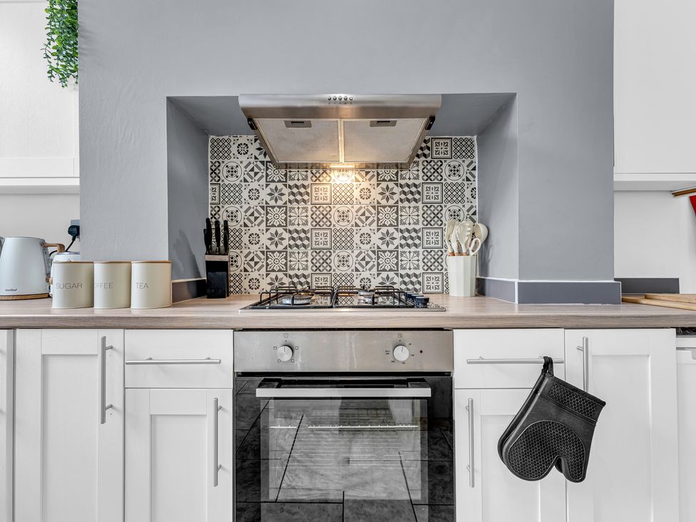A kitchen with an oven and stove at Peak View Terrace