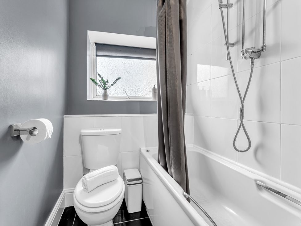 A bathroom with a bathtub and shower at Peak View Terrace