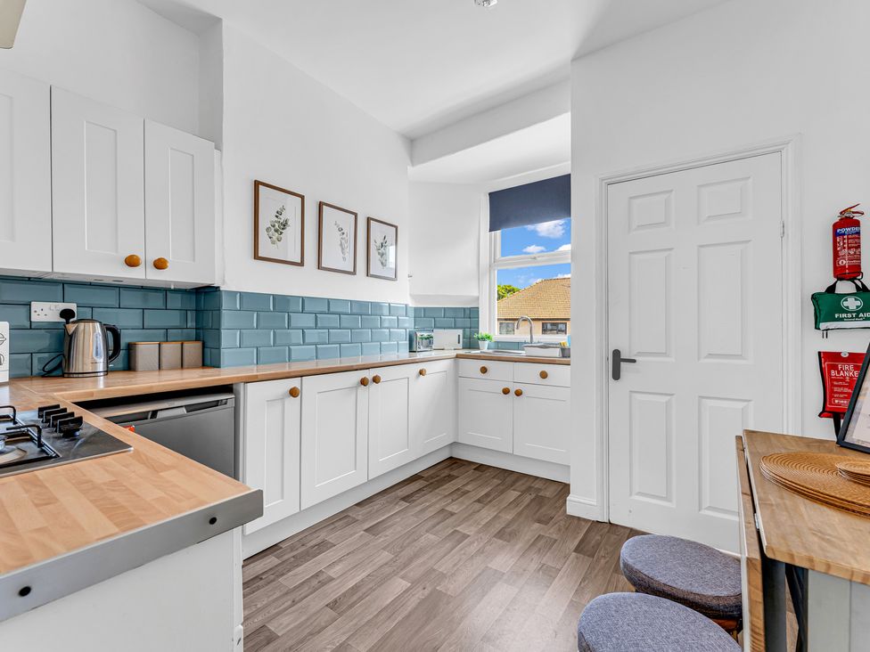 A kitchen with a kettle and utensils at Peak Side Terrace in Buxton
