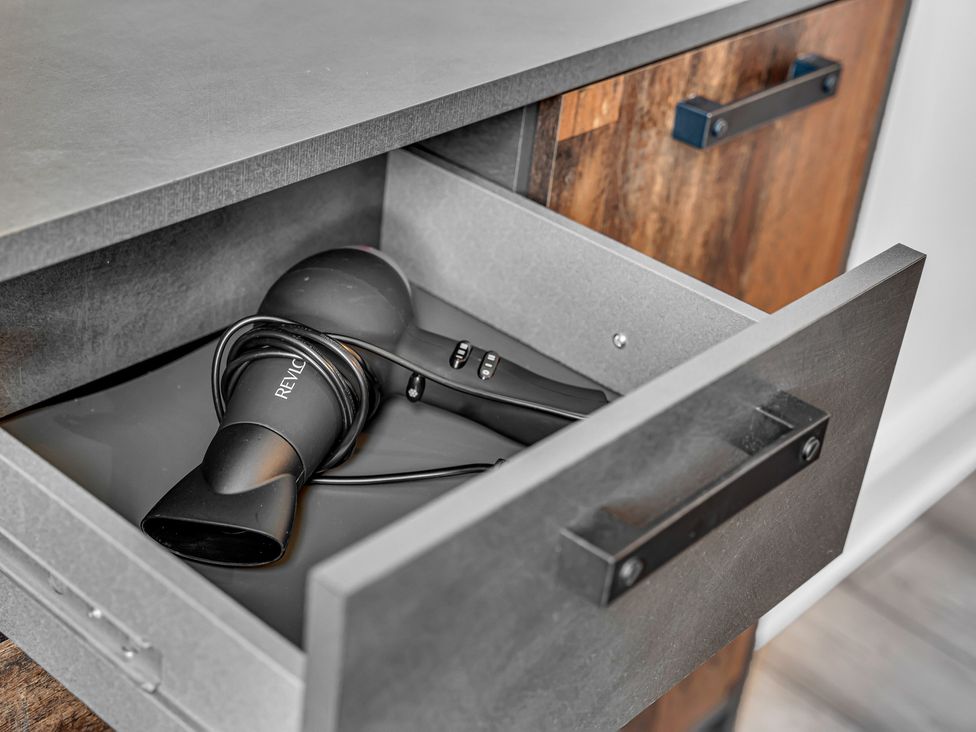 A hair dryer in a drawer at Peak Side Terrace in Buxton