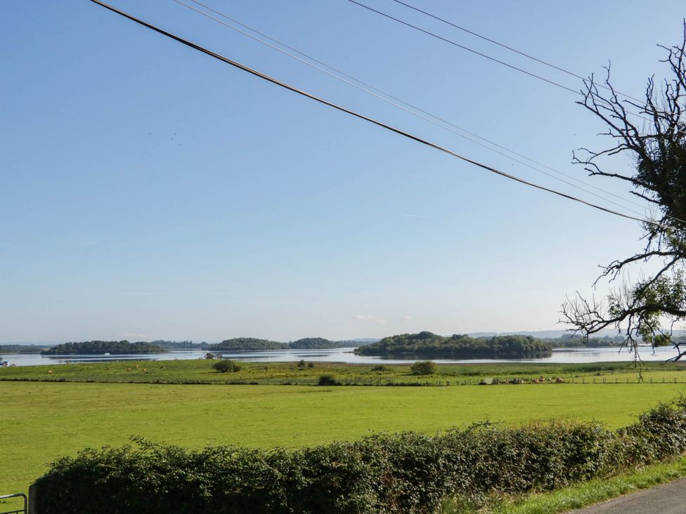 A view of a lake with grassland and islands at The Mummers Studio Apartment 1 Derrylin, County Fermanagh