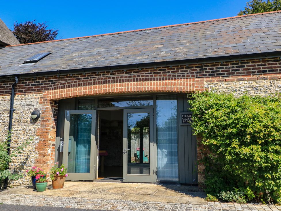 An entrance with double doors and window at Frome Gazey in Frampton