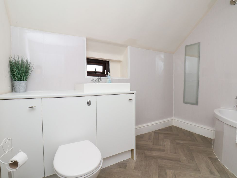 A bathroom with a sink and toilet at Granary in peterculter