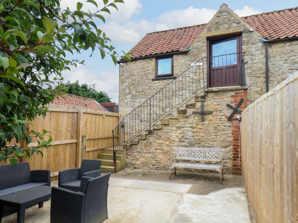 An outdoor area with stairs and seating at Granary in peterculter