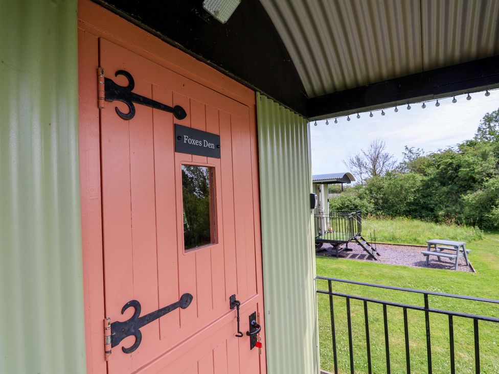 An entrance door at Foxes Den in Whitchurch
