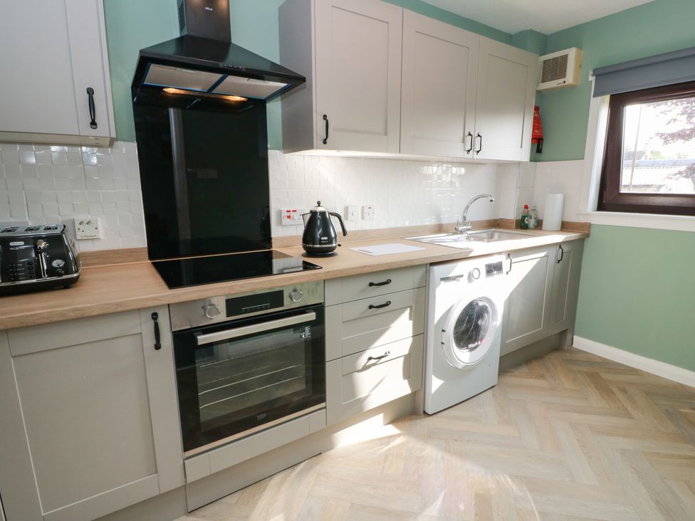 A kitchen with appliances and fixtures at No.31 Craigard Road