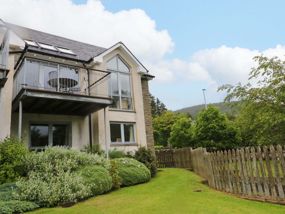 A house with a balcony and garden at Craigard in Aberfeldy