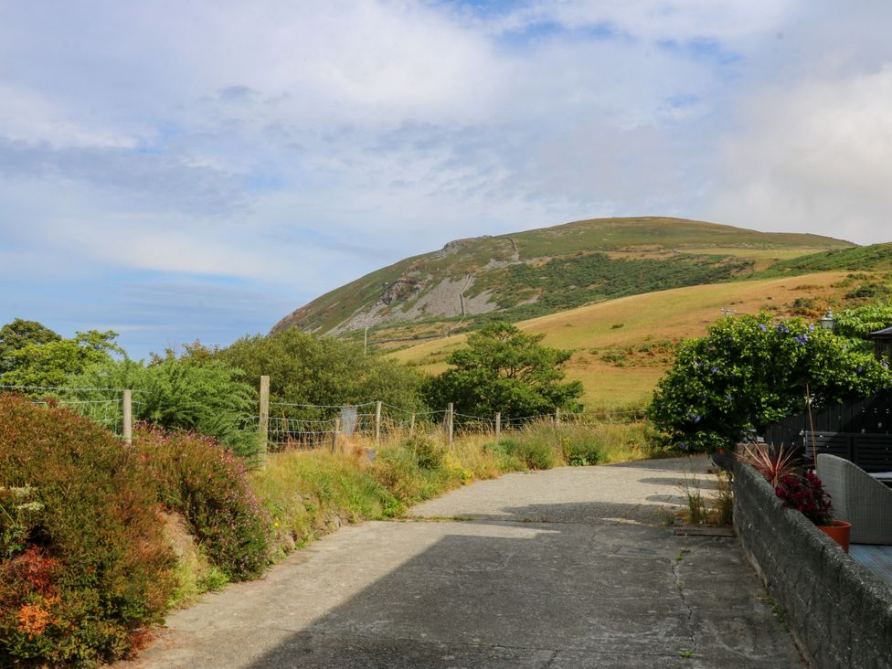 A pathway leading to a mountain at Tyr Felin near Trefor