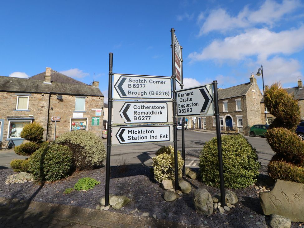 A directional sign with multiple routes at a street in Middleton-In-Teesdale