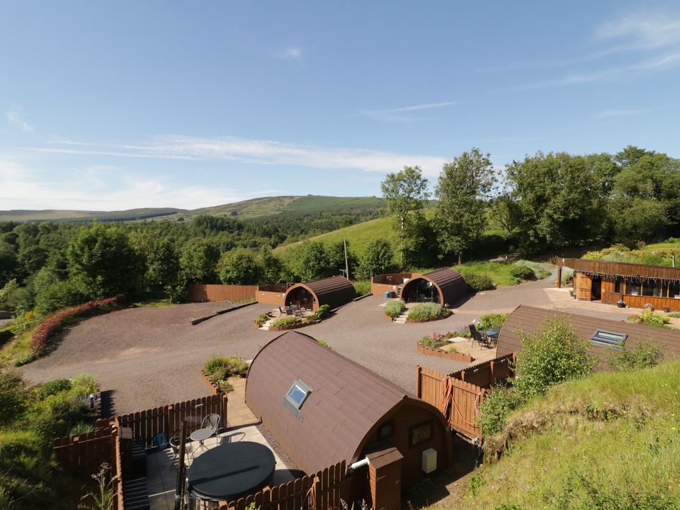An outdoor view of glamping pods at Gortin Glen Glamping Pod 1