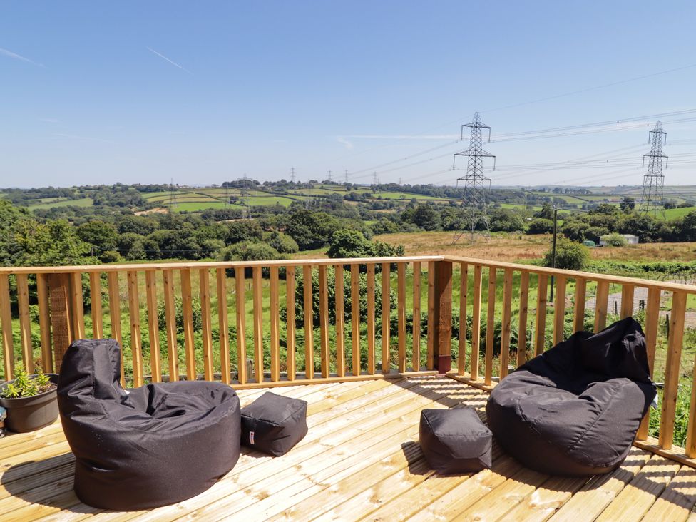 An outdoor area with bean bags and a view at Farm Cottage in 