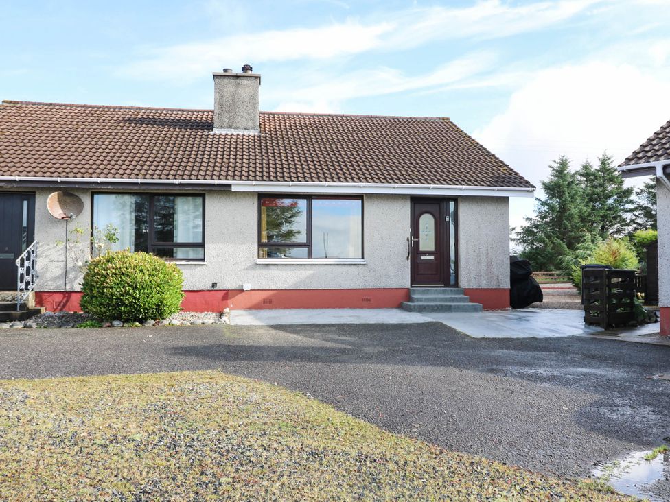 A house with a front door and garden at 7 Creag Ruadh in Laxdale near Stornoway