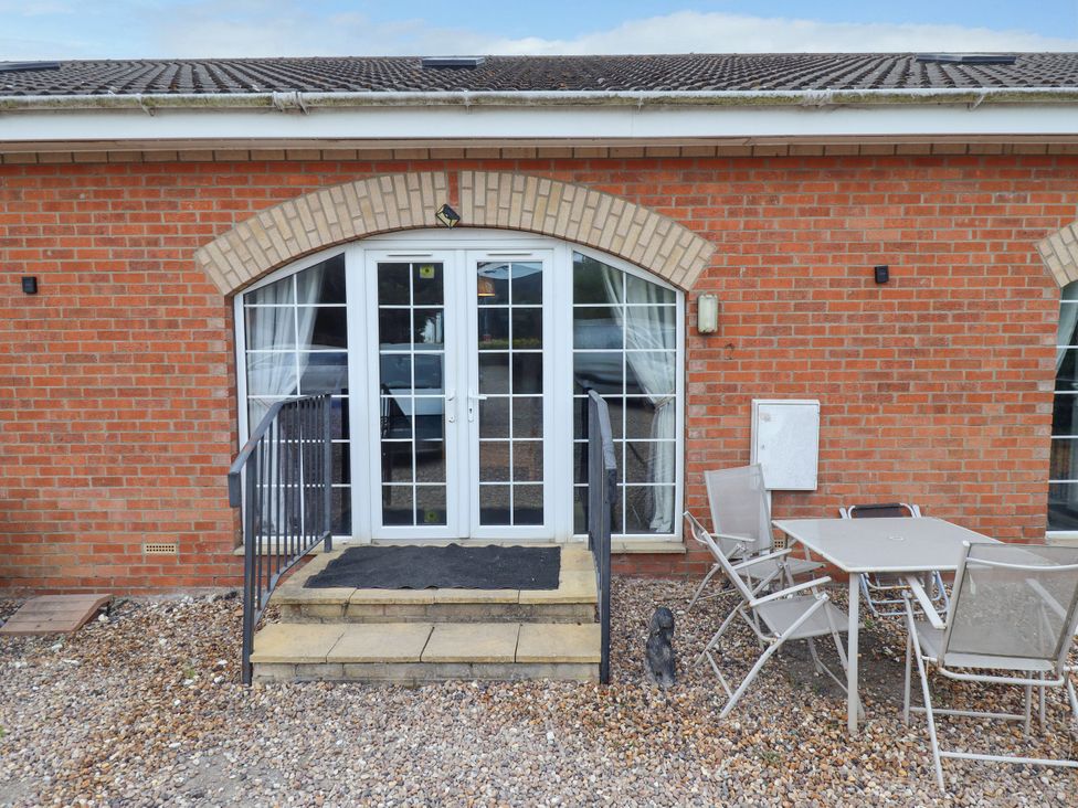 An outdoor area with steps and seating at Holiday Cottage 2 in Skegness