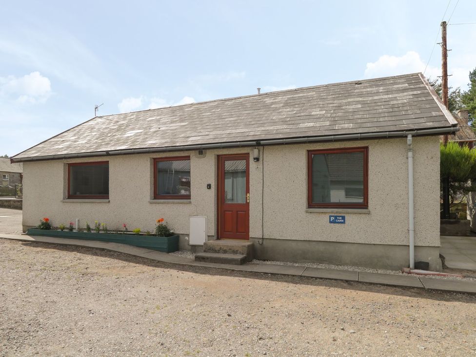 A house with a parking sign at The Cairn