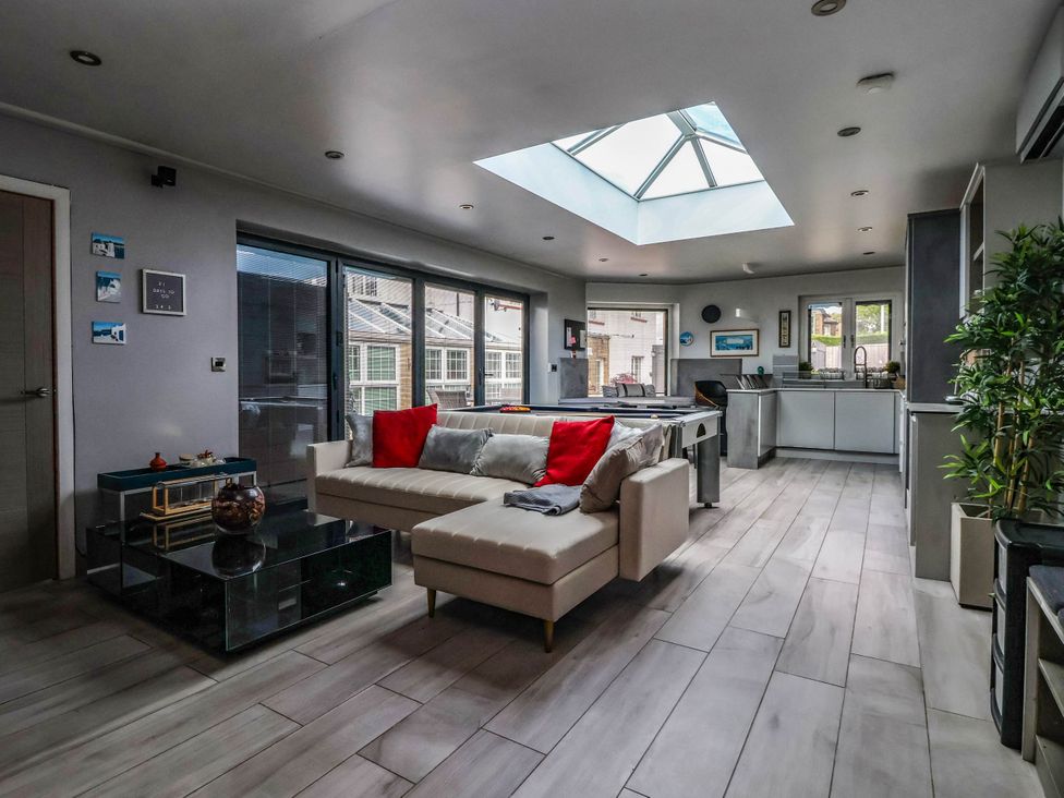 A living room with a sofa and coffee table at The Annexe in Shipley