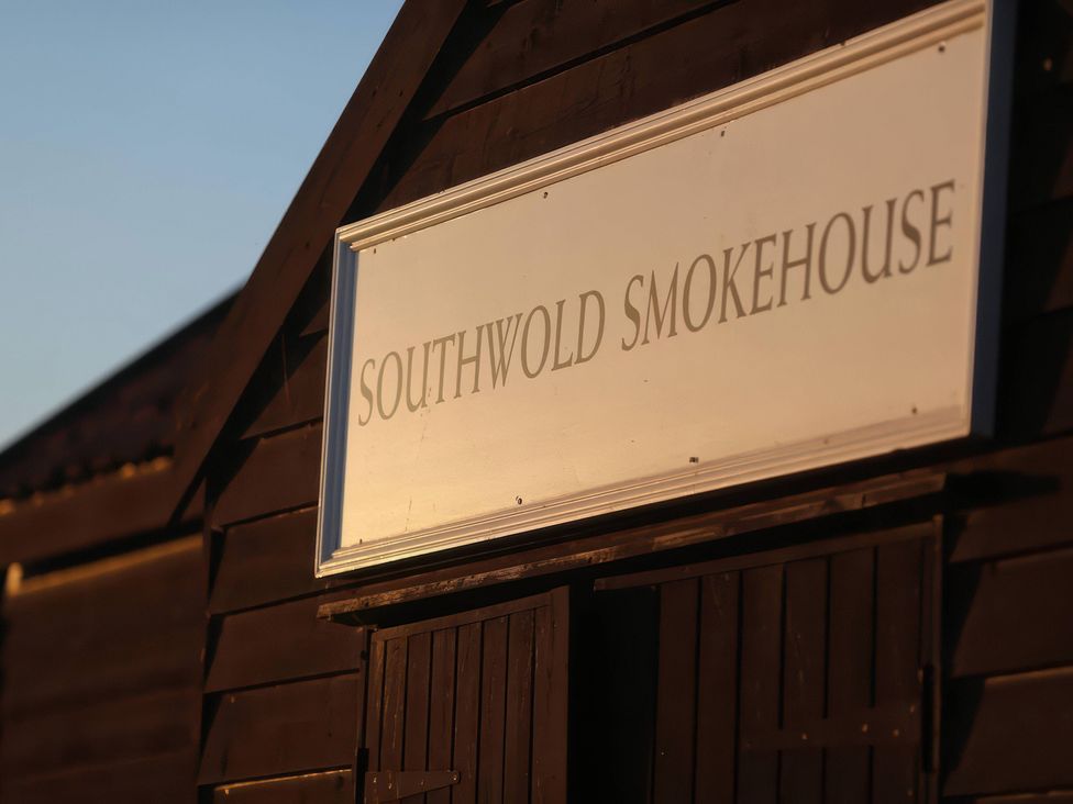 A building with a sign reading Southwold Smokehouse at No 1 The Martins Walberswick